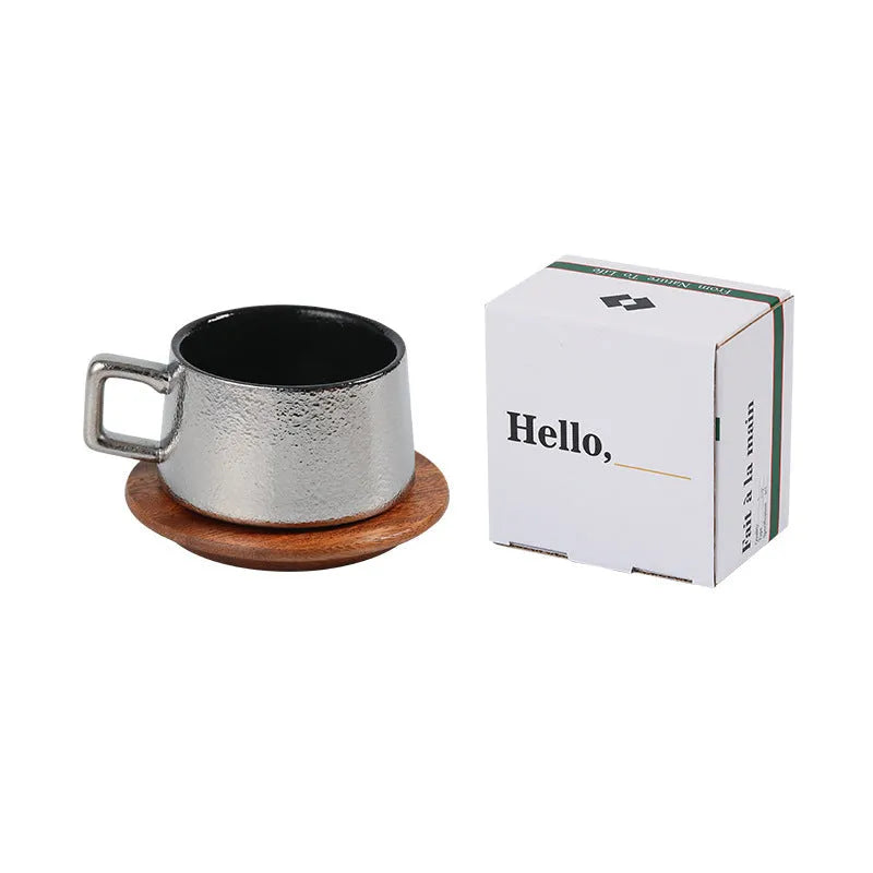 Office gift set showing stainless steel travel tumbler inside a gold-plated presentation box with optional gift bag.