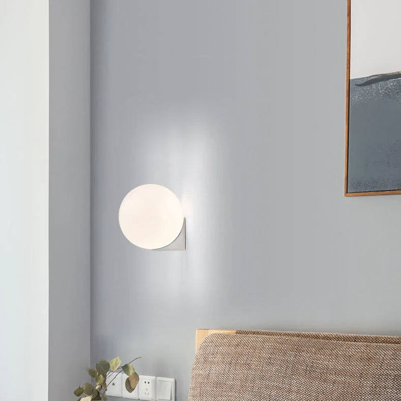 Nordic minimalist wall lamp with adjustable double heads in black finish mounted on white wall