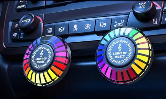 Car atmosphere light with RGB lighting installed in air vent, showing voice control and aromatherapy functions