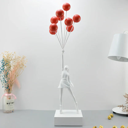 Bubble Girl natural resin sculpture ornament in white with red ball, 10-15 cm tall hanging modern decor piece