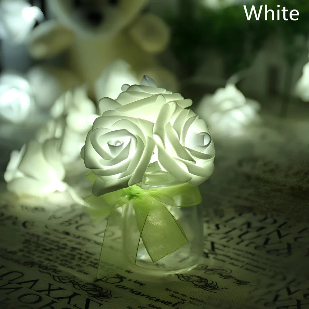 3-metre long battery-powered LED floral string lights with 20 white floral units on green plastic stems