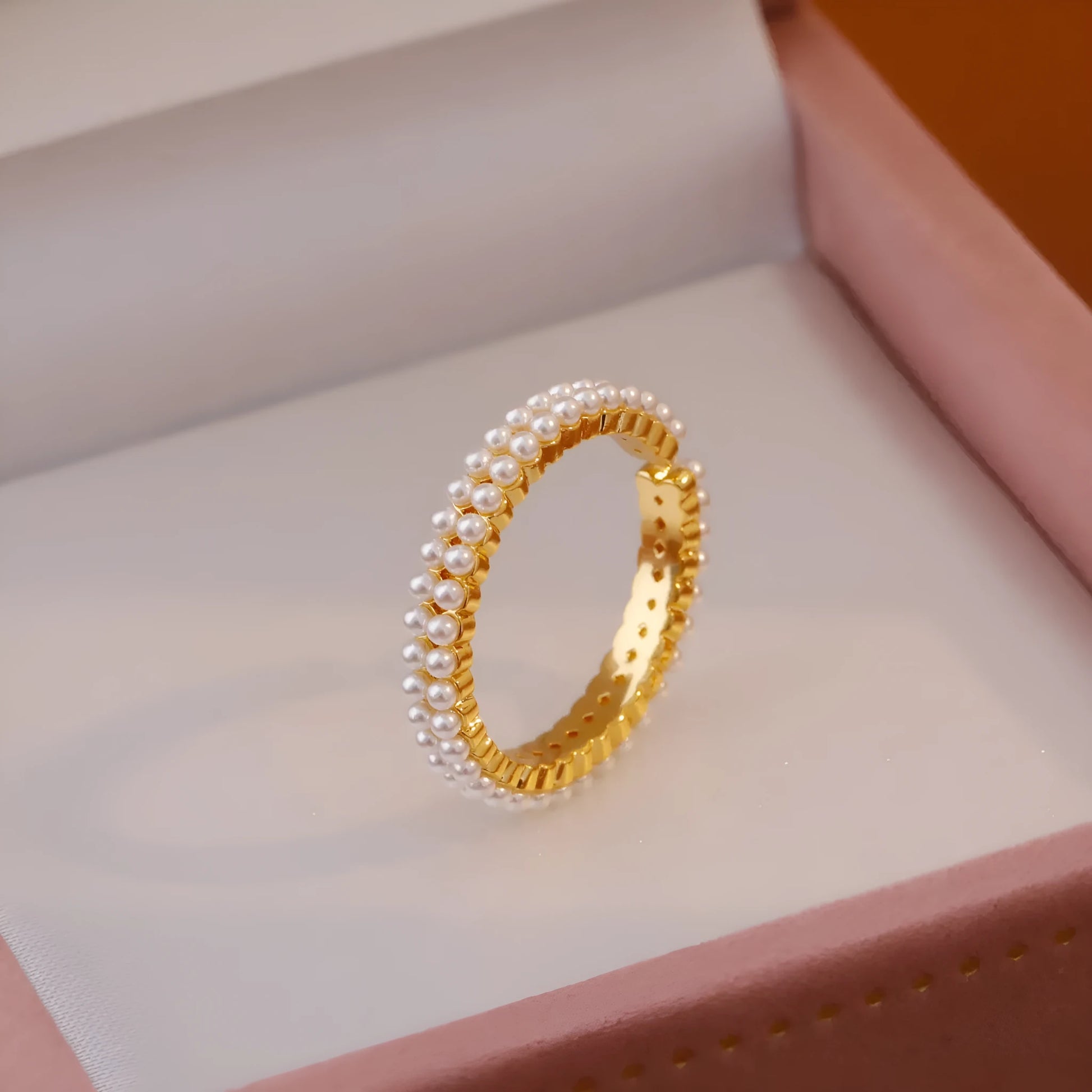 Gold electroplated pearl ring with open mouth geometric design and round pearl elements