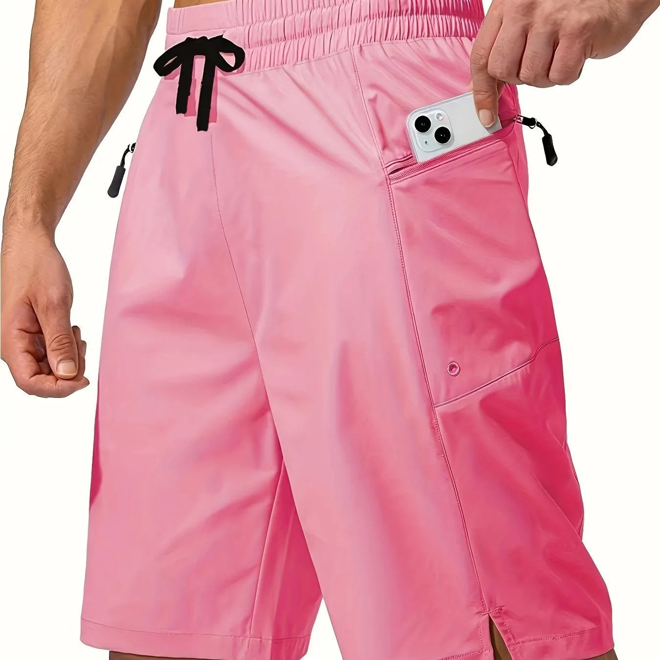 Men's solid-colour quick-drying beach shorts in a straight-leg style on a neutral background.