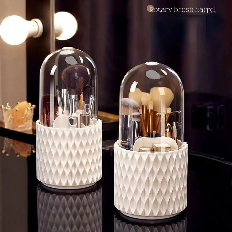 White rotating acrylic makeup brush holder with transparent dust cover on desktop