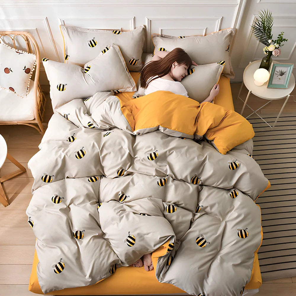 Aloe cotton bedding set with cartoon patterns, available in four colours for UK bed sizes 0.9m to 2.2m