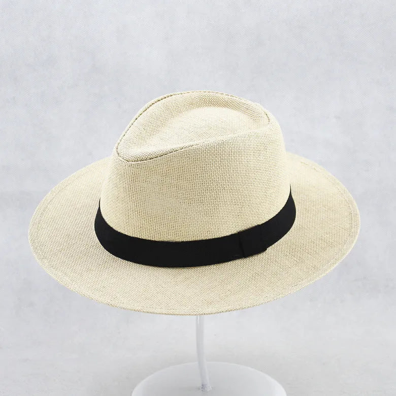 Men's wide brim flat top sun hat in beige colour with a paper fabric construction.