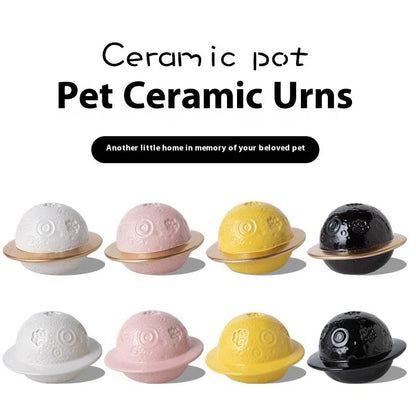Handmade ceramic cinerary casket with cosmic starry sky design and cat-dog motifs in multiple colours