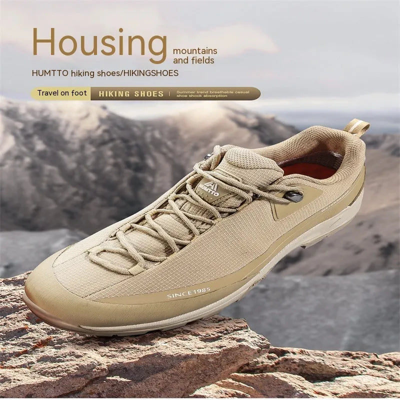 Low-top mountain climbing shoes men's hiking boots with non-slip rubber outsole, Feilong midsole, and breathable leather mesh upper available in black, dark grey, maroon, and sand colours