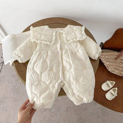 Newborn in light beige fleece-lined quilted cotton jumpsuit with single-breasted closure