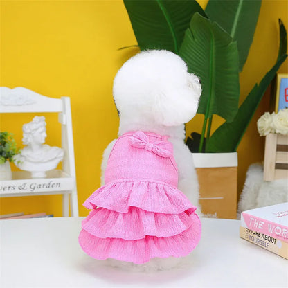 Small dog wearing polyester princess dress with layered skirt in rose red colour