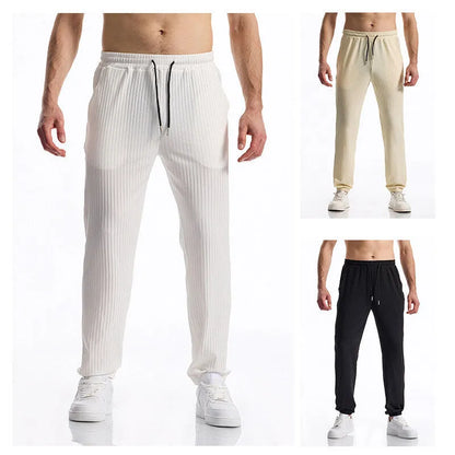 Silky rib fabric baggy straight trousers with drawstring waistband in black, white or khaki colours