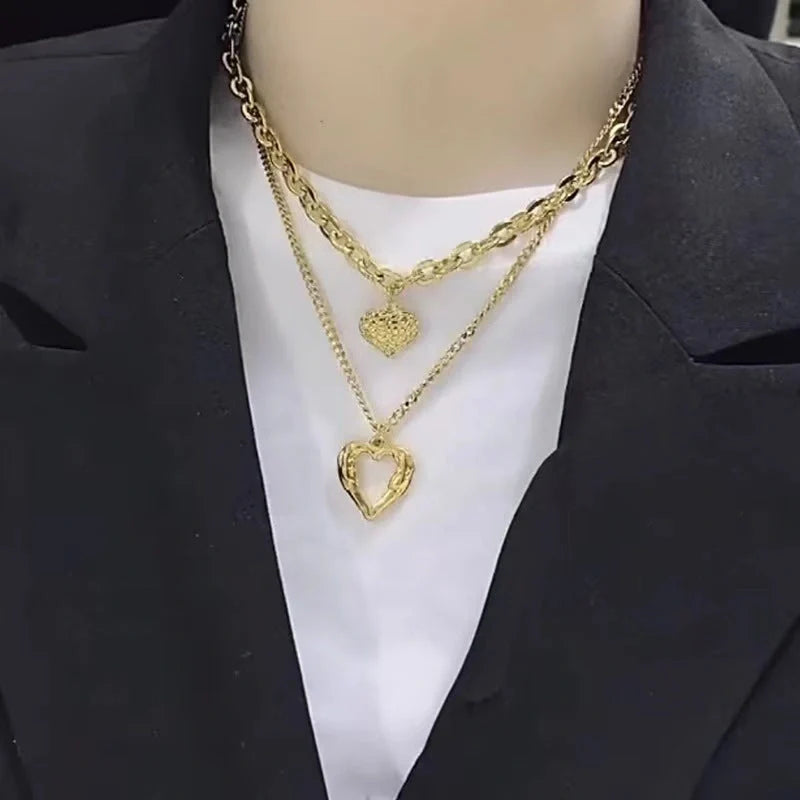 Stylish Titanium Steel Angel Wings Heart Necklace for Women in silver and golden finishes.