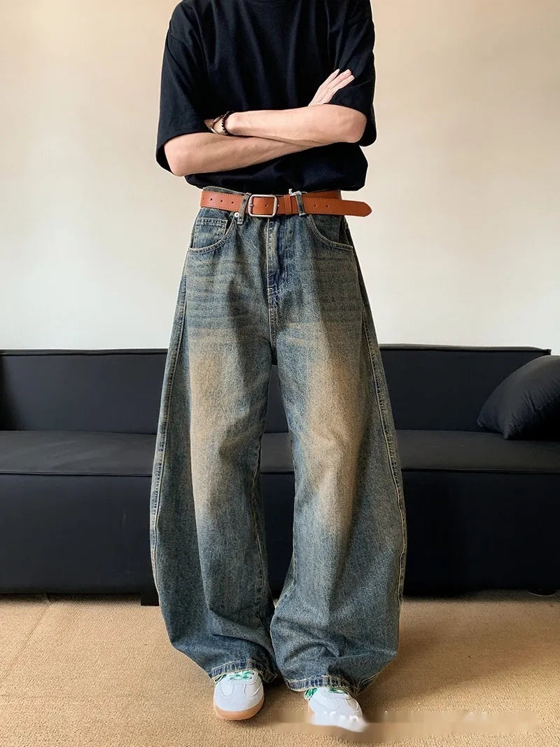 Men's jeans in retro blue cotton blend fabric with micro elasticity for a slim fit and wide leg silhouette, featuring a mid-waist cut and distressed detailing for a summer casual look, available in sizes from S to 3XL.