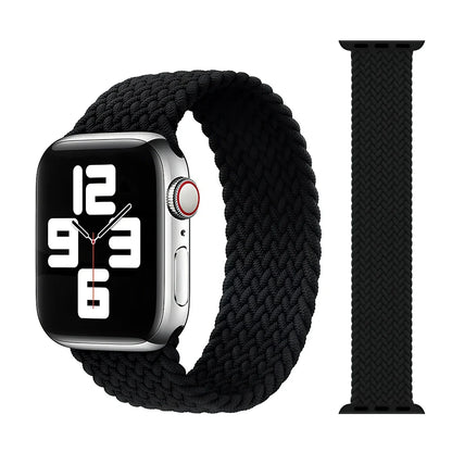 Apple Watch with elastic braided nylon strap in single-loop design showing stretch capability