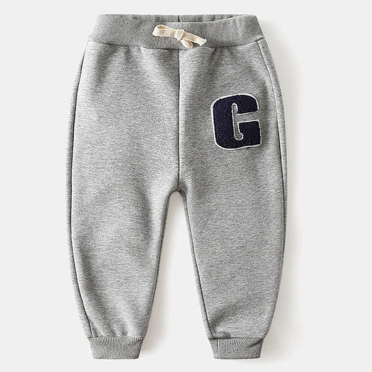 Children's grey cotton trousers with embroidered letter detailing on velvet trim, low-waist design