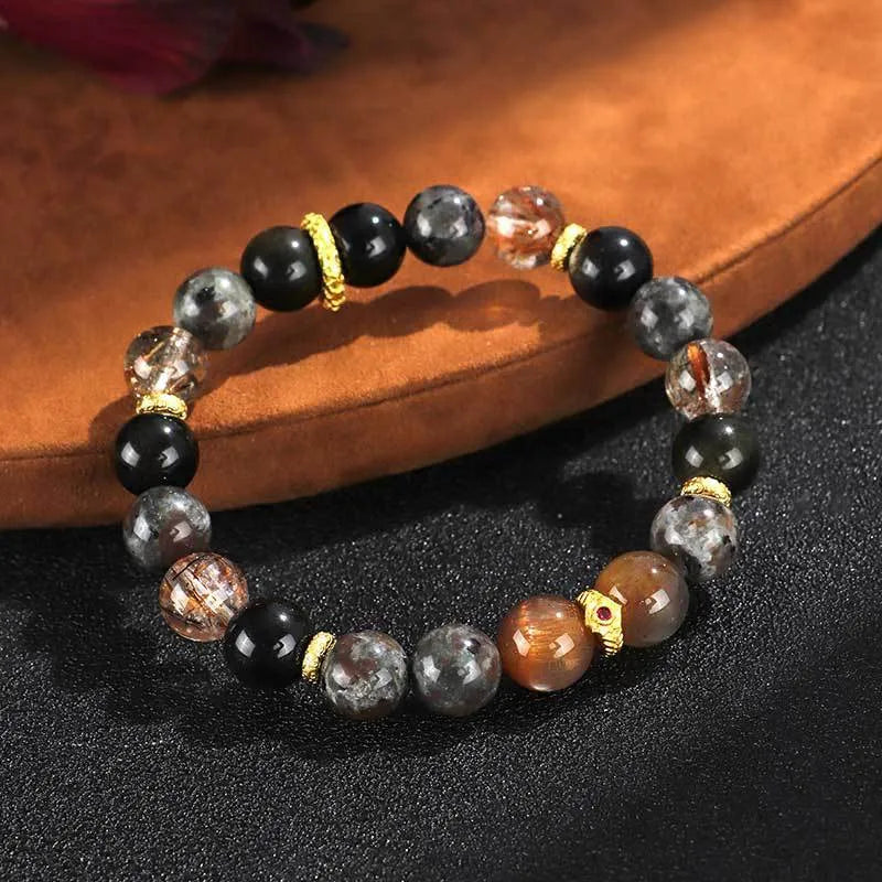 Handcrafted black Sunstone flame stone Wukong bracelet on wrist showing stone bead detail