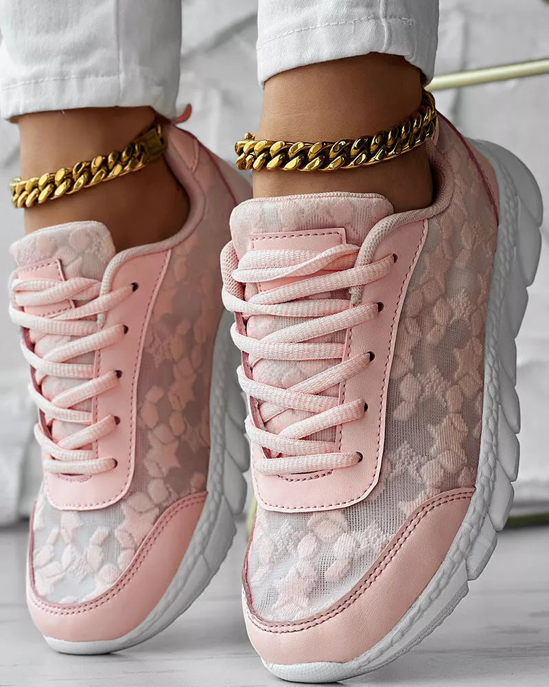 Women's lightweight canvas running shoes in white, black, blue, and pink