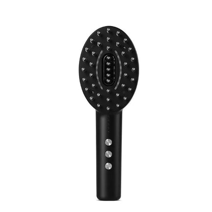Handheld KD3802 black scalp massager with vibrating application nodes and USB charging cable on a white background.