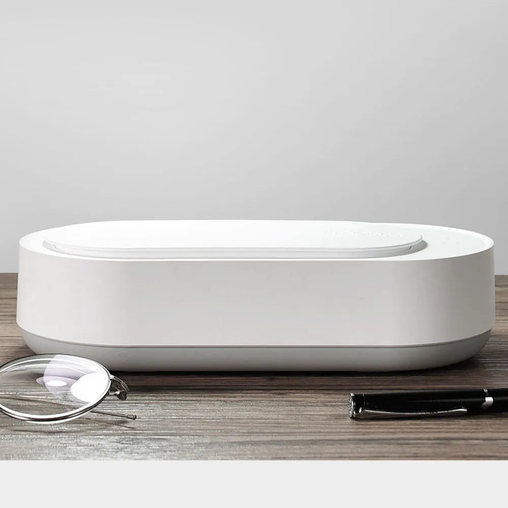 White portable ultrasonic cleaner with stainless steel tank for cleaning jewellery and glasses