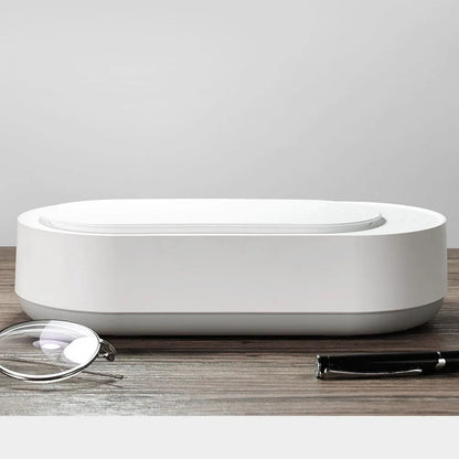 White portable ultrasonic cleaner with stainless steel tank for cleaning jewellery and glasses