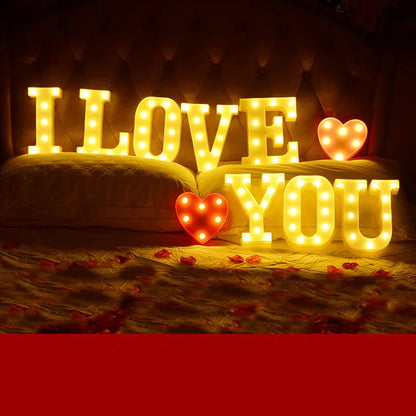 Plastic LED alphabet letter light spelling a message for a birthday or proposal.