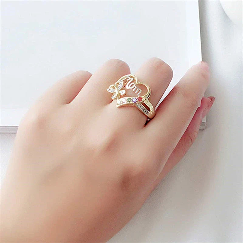 Elegant gold-plated heart-shaped ring with multi-colored rhinestone embellishments, a thoughtful Mother's Day gift