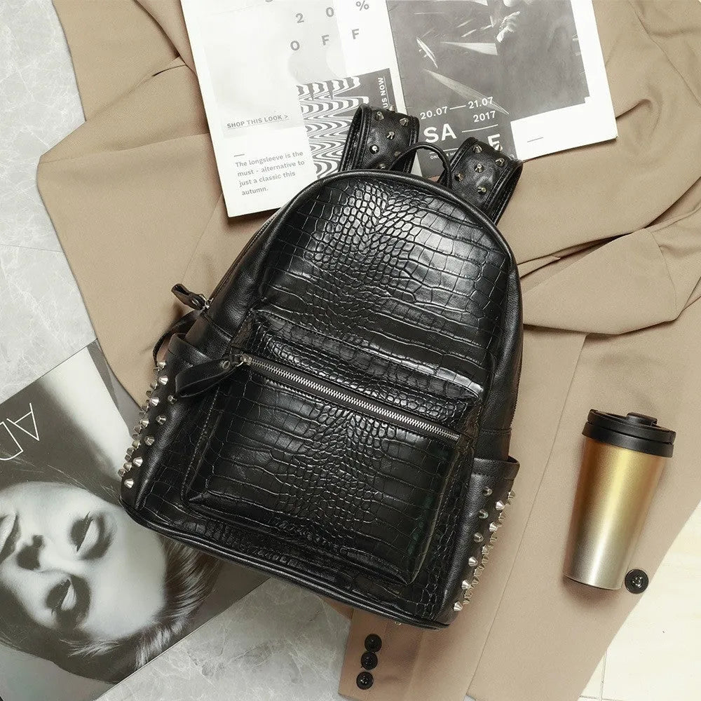 Black men's waterproof computer schoolbag with oil wax leather and rivet detailing.