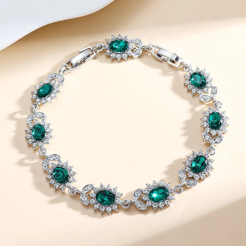 Personality Trend women's simple bracelet with inlaid zircon stones in a choice of nine gemstone colours on a wrist.