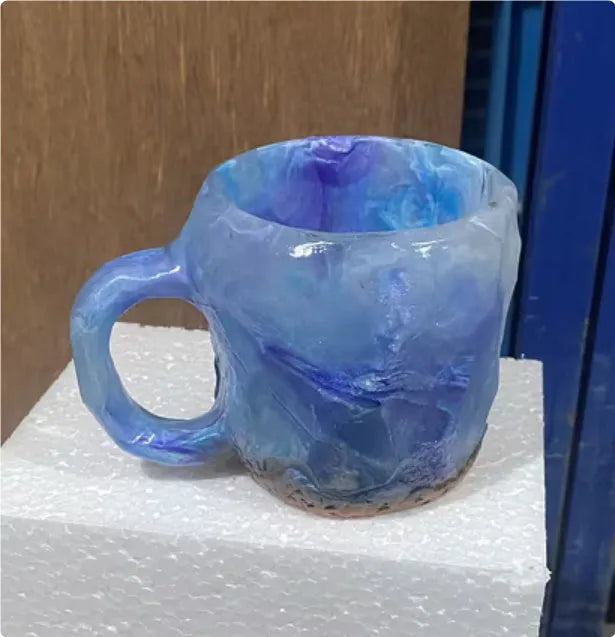 400ml resin mineral crystal coffee mug with handle in assorted colours including purple, blue, and pink.