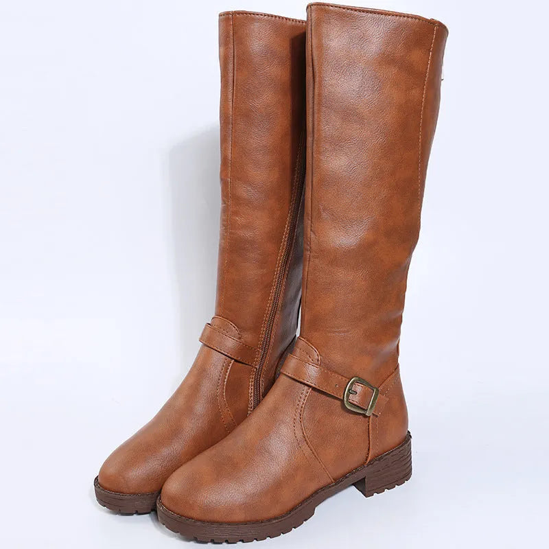 Women's black high knight boots with a square heel, round toe, and ankle buckle detail.