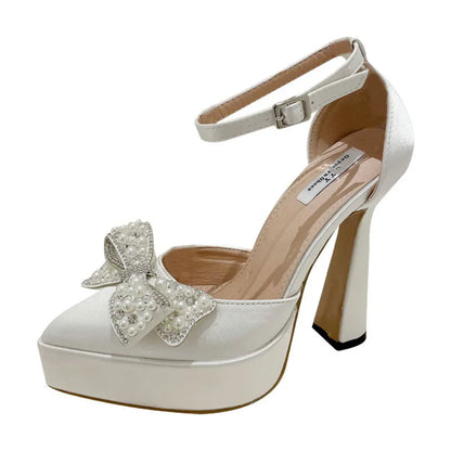 Women's black satin pointed-toe sandals with a bow detail and loop strap