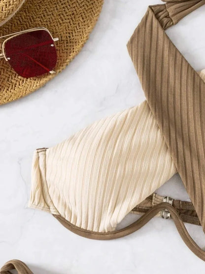 Women's two-tone bikini with cross-back design and steel underwire support in available colour options