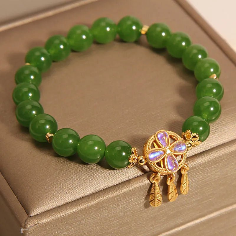 Green Jasper crystal bracelet for women with a four-leaf clover dream catcher pendant.