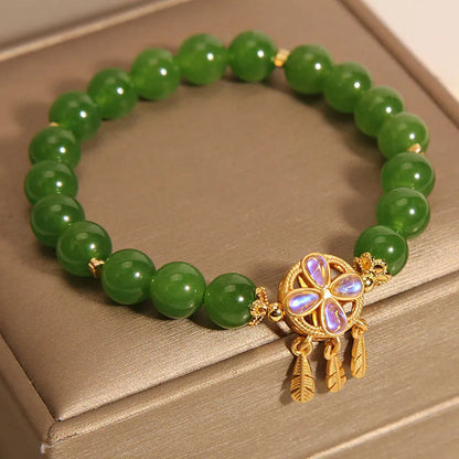 Green Jasper crystal bracelet for women with a four-leaf clover dream catcher pendant.