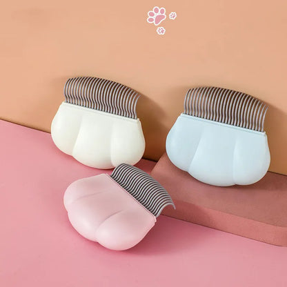 Blue Paw Soft deshedding brush for removing matted fur from cats and dogs on a white background.