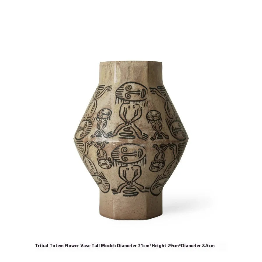Hand-painted ceramic vase with religious patterns and carved texture in cylindrical shape