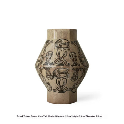 Hand-painted ceramic vase with religious patterns and carved texture in cylindrical shape