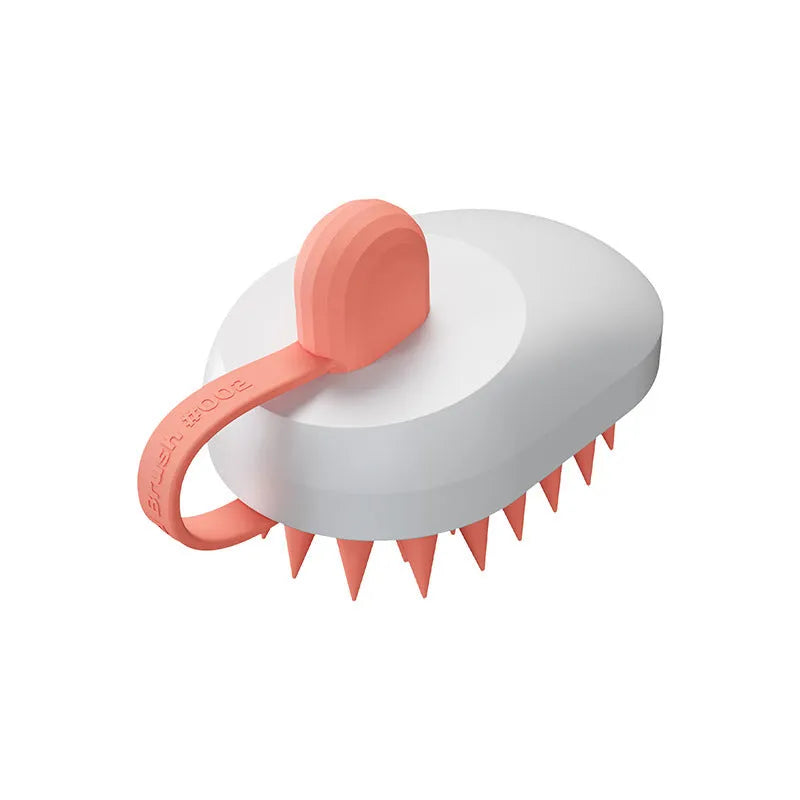Handheld silicone pet hair remover and massage brush in blue, for use on dogs and cats during bathing.