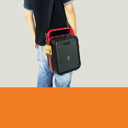 MS62AI portable Bluetooth speaker with wireless microphone on a table, showing control knob and carry strap.
