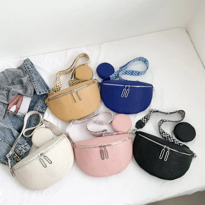 Women's solid colour PU crossbody bag with saddle lock zipper texture in clamshell design