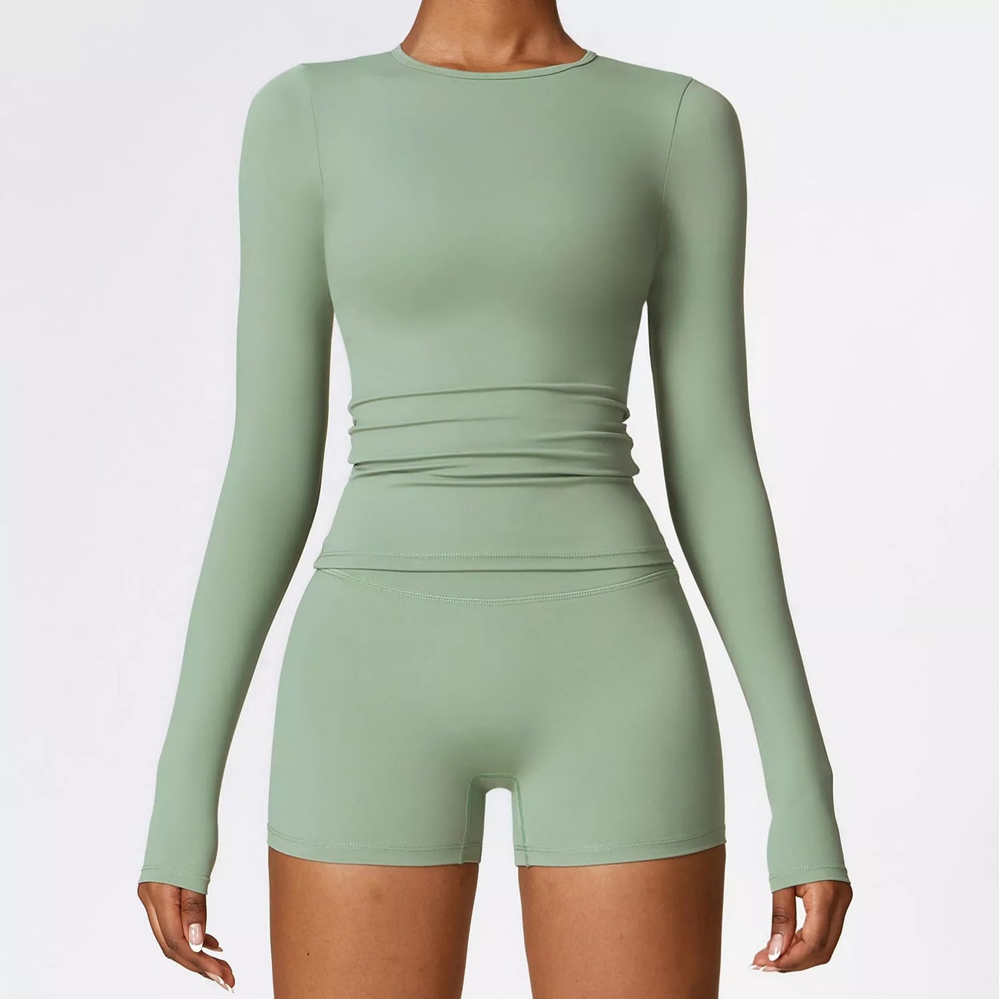 Women's slim long sleeve pullover top for yoga and fitness in various colors
