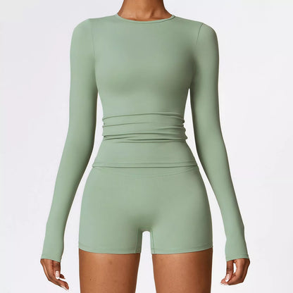 Women's slim long sleeve pullover top for yoga and fitness in various colors