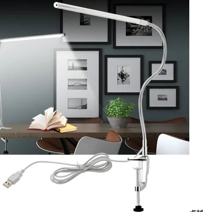Silver aluminium alloy LED nail lighting table lamp with long arm and clip mounting for beauty workstations