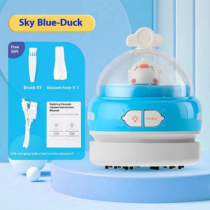 USB-powered handheld desktop vacuum cleaner in blue colour cleaning computer keyboard