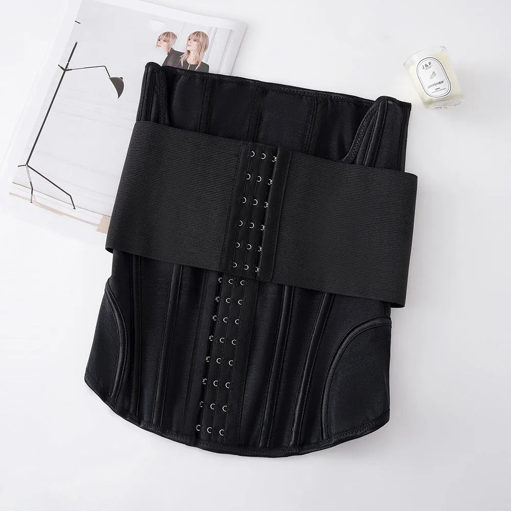 Black belly band waist trainer with adjustable tie on mannequin, showing nylon fabric construction
