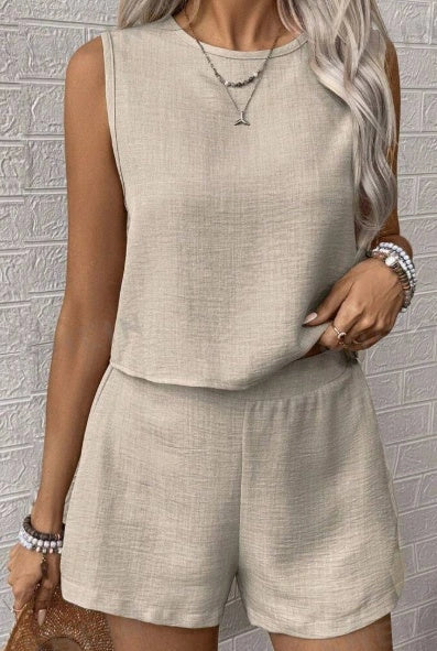 Sleeveless top and shorts set in various colors, including apricot, black, and blue, with a minimalist, camisole-style design and relaxed, comfortable fit.