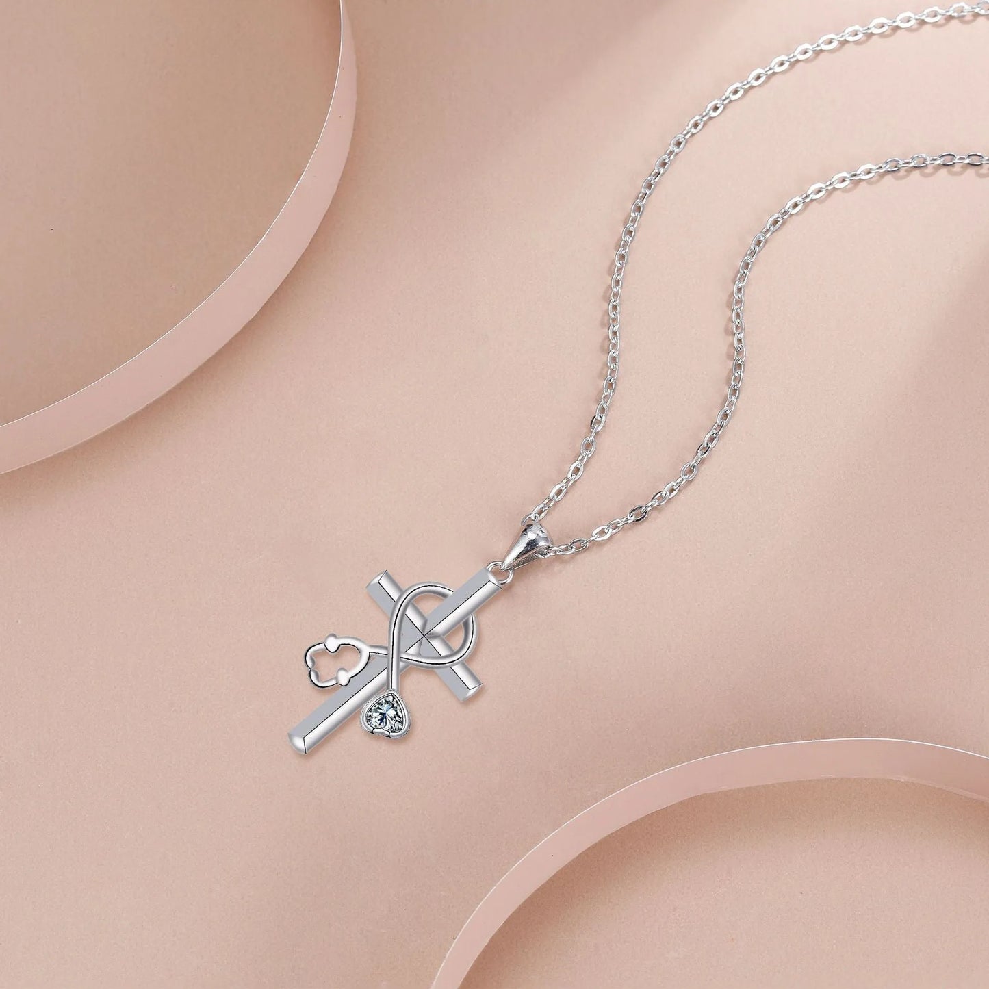 Women's cross stethoscope necklace with electroplated copper pendant on a cross chain