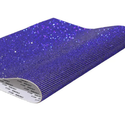 Rhinestone sticker net on backing sheet for hot drilling application to fabrics in multiple colour options