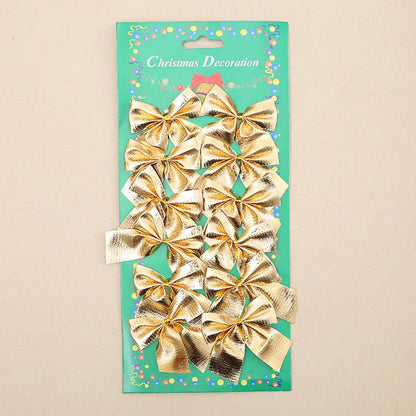Polyester Christmas tree bow ornament in red, gold, and silver colours measuring 5 cm wide