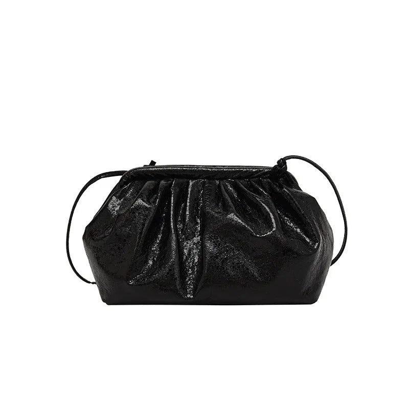 Simple hair clip closure crossbody bag in shell shape with sewing line detail on rose red PU material
